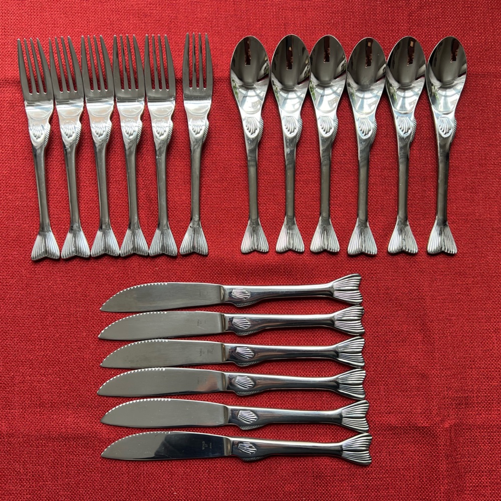 18 piece set of flatware / cutlery with fun fish-tail and shell design.